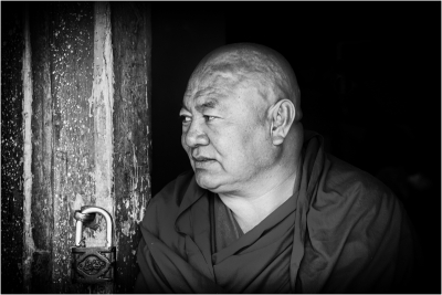 Tibetan Monk in a Doorframe